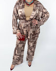 Printed set with a scarf  от polyester, viscose и elastan, показана в изображението.