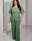 Blouse and trousers set  от polyester и lycra, показан на изображението, в модерен стил и комфортен дизайн.