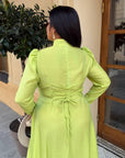 Elegant midi dress in viscose and polyester with a clean design and stylish cut, suitable for formal occasions.