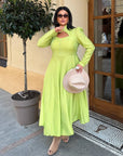 Elegant midi dress in viscose and polyester, suitable for everyday and formal wear, in soft colours.