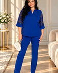 Elegant lace set in polyester, viscose and elastane, black, with delicate lace details.