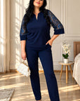 Elegant lace set, made of polyester, viscose and elastane, with delicate lace details.