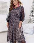 Dress with ornaments and a split