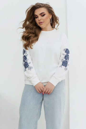 Sweater with appliqué