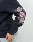 Sweater with appliqué