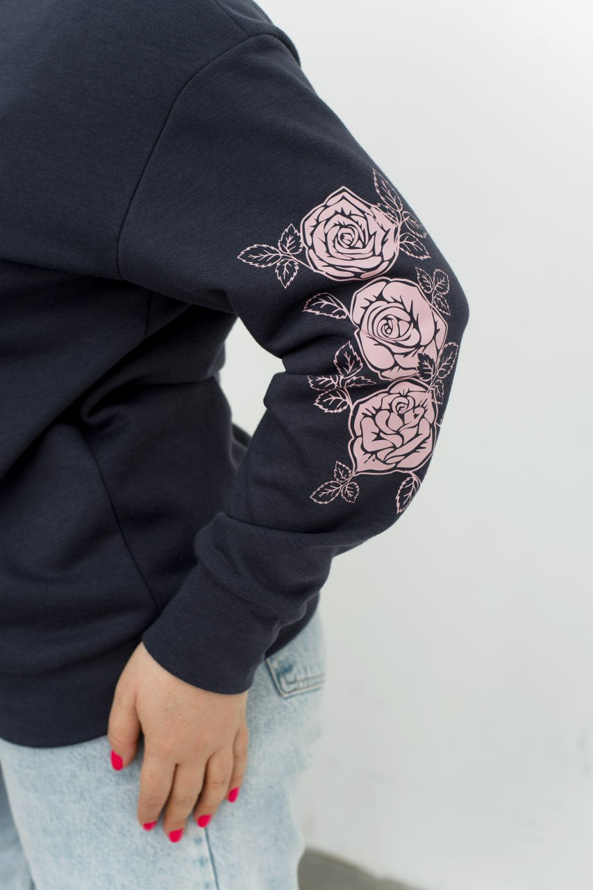 Sweater with appliqué