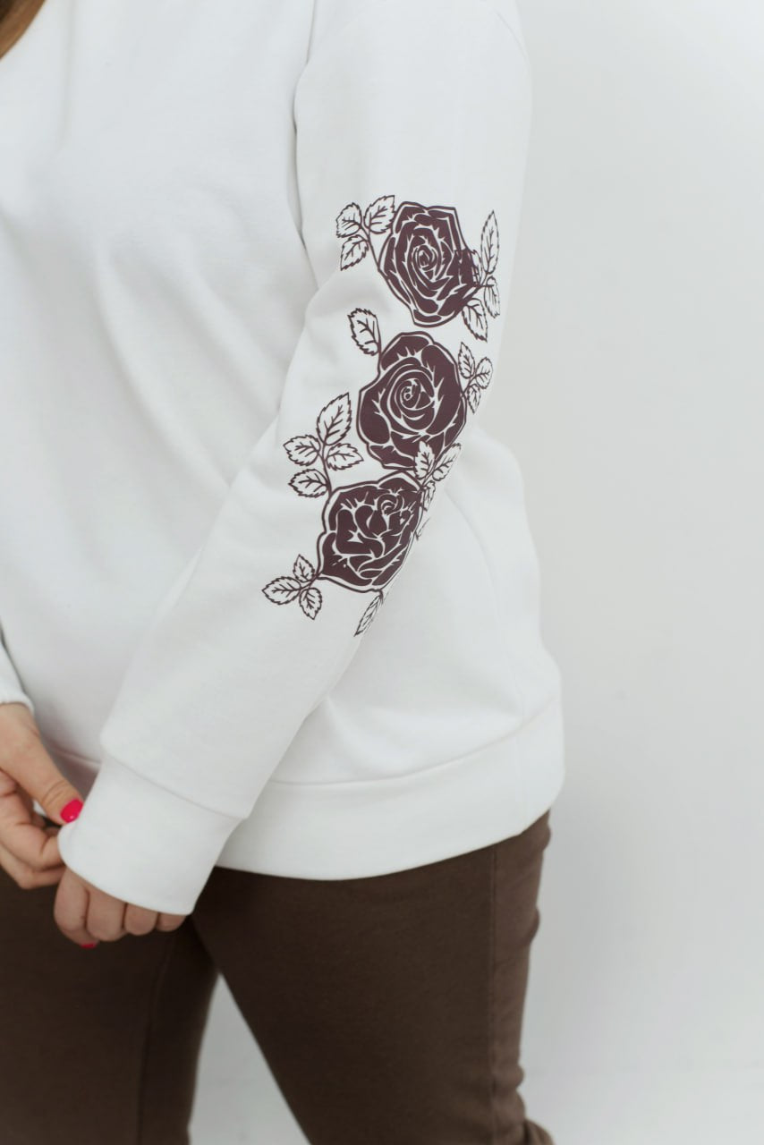 Sweater with appliqué