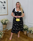 Vestido midi con cuello llamativo