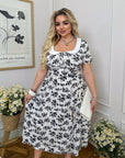 Vestido midi con cuello llamativo