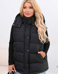 Комплект с елек и качулка от polyester, стиlinen  и топъл, подходящ за зимни дни.