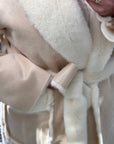 Long mixed-fabric coat in polyester and spandex, a stylish black style.