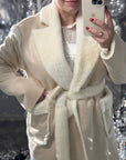 Long mixed-fabric coat in polyester and spandex, in a classic style, shown on a model.