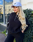 Fleece set with wide-leg trousers in polyester and elastane, comfortable and stylish, shown in the image.
