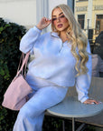 Fleece set with wide-leg trousers, polyester and elastane, comfortable and warm, image of a fashionable sporty outfit.