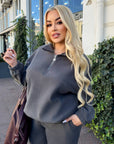 Fleece set with wide-leg trousers in polyester and elastane, shown on a model, made for comfort and warmth.