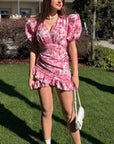 Short dress with puff sleeves  от марката NewYear25, cotton и polyester, изображение на модел с ярък дизайн.