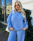 Fleece set with wide-leg trousers in polyester and elastane, comfortable and warm for everyday wear.