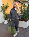 Velour hooded set in polyester and spandex, shown in the image, comfortable and stylish for everyday wear.