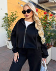 Velour hooded set in polyester and spandex, comfortable and stylish for everyday wear.