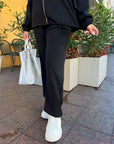 Velour hooded set in polyester and spandex, an elegant sporty outfit.