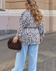 Kimono estampado con cinturón de satén