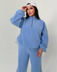 Warm fleece set in polyester and elastane, image of a cosy and warm set for winter days.
