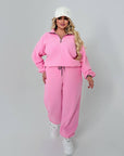 Warm fleece set in polyester and elastane, suitable for winter sports and keeping warm, image with jacket and trousers.