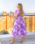 Cotton floral dress  от Composition с дълги Sleeveи и V-образно деколте, подходяща за летни дни.