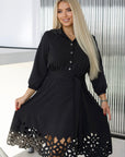 Flared dress with cut-outs and stones, polyester and viscose, stylish design, suitable for formal occasions.