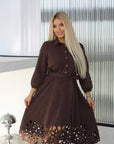 Flared dress with cut-outs and stones, polyester, viscose and spandex, stylish design and an elegant silhouette.