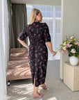 Цветна Knee-length floral dress  от viscose и polyester, подходяща за празнични поводи, с летящ дизайн.