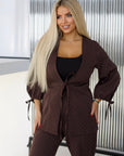 Elegant embellished dress in polyester, viscose and spandex, stylish design, suitable for special occasions.