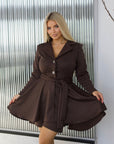 Short dress with shorts in polyamide, polyester and elastane, shown in the photo.