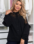 Elegante blouse met opvallende borduursels