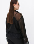 Blusa transparente holgada con top