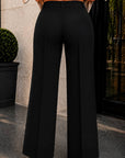 Pantaloni eleganti cu picioare late