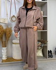 Fleece set with stripes in polyester and elastane, with a fashionable design and comfortable cut, suitable for winter wear.