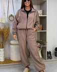 Fleece set with stripes in polyester and elastane, comfortable and warm, suitable for winter sports and everyday wear.
