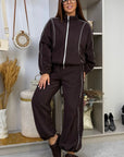 Fleece set with stripes in polyester and elastane, in bright colours, suitable for sport and everyday wear.