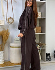 Fleece set with stripes in polyester and elastane, image of a comfortable tracksuit with a fashionable design.