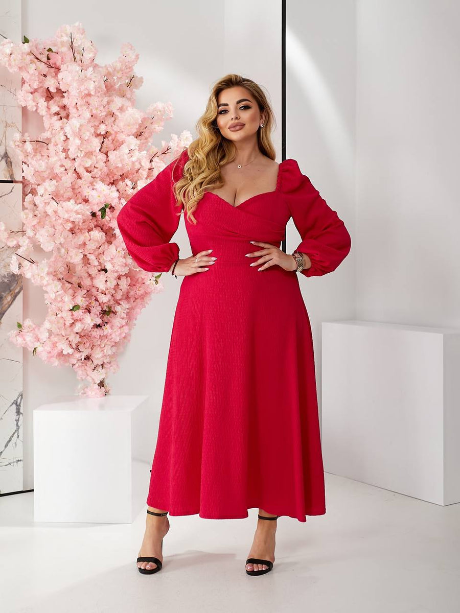 Dress with voluminous sleeves