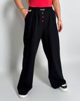 Стиlinen  polyesterен pants с декорации и копчета, висока седалка, модел с модерен дизайн и комфортен крой.