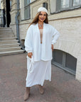 Cropped cardigan with a belt made from polyester and viscose, image of stylish model with accessories and modern look.
