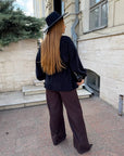 Cropped cardigan with a belt made from polyester and viscose, model with elegant design and fashion details, image of a model.