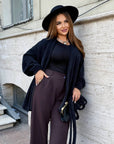 Cropped cardigan with a belt made from polyester and viscose, stylish design, image of fashion model with the cardigan.