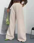 Women's wide-leg trousers made from polyester, viscose and spandex, with pleasant texture and comfortable cut.