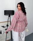 Checked shirt with a belt made from cotton and polyester, with classic design and modern look, suitable for everyday style.