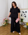 Комплект от памучна Fabric с волан, 70% cotton и 30% polyester, за комфорт и стил.
