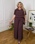 Комплект от памучна Fabric с волан, съдържа 70% cotton и 30% polyester, с деликатен дизайн и фини детайли.