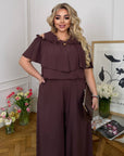 Комплект от памучна Fabric с волан, 70% cotton и 30% polyester, изображение на дреха с деликатен дизайн.